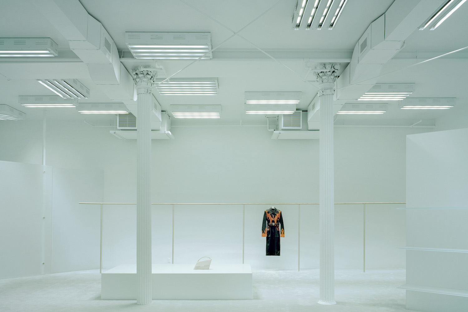 blank white room, one garment hanging