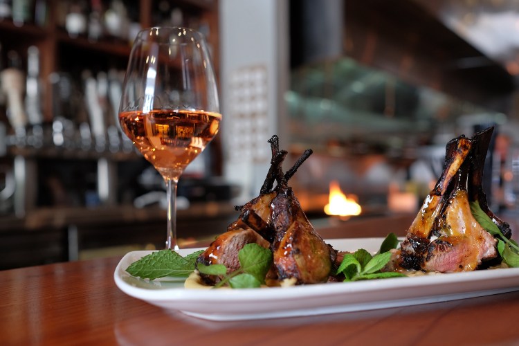 wine and plated food in the Barrel room