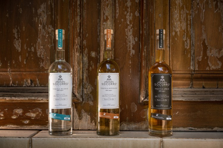 Three of Socorro Tequila's bottles: blanco, reposado and añejo