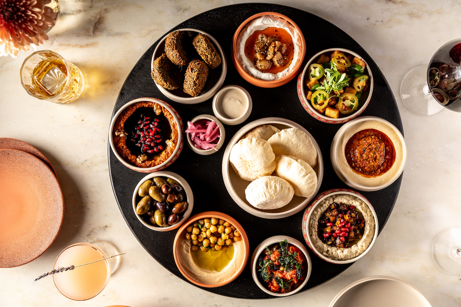 Mediterranean food: falafel, hummus, pita, vegetables, chickpeas