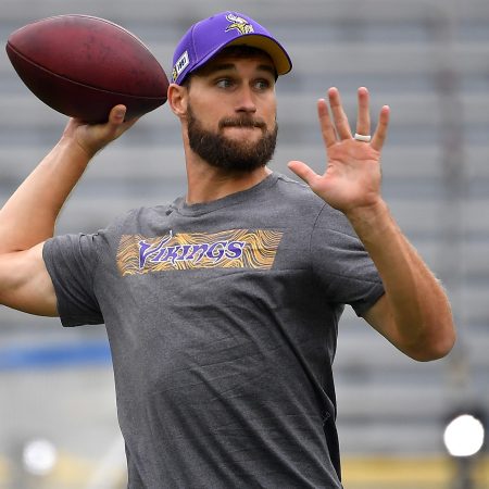 Former Viking Kirk Cousins throws a football. He's one of the quarterbacks heading to a new team during QB carousel season.