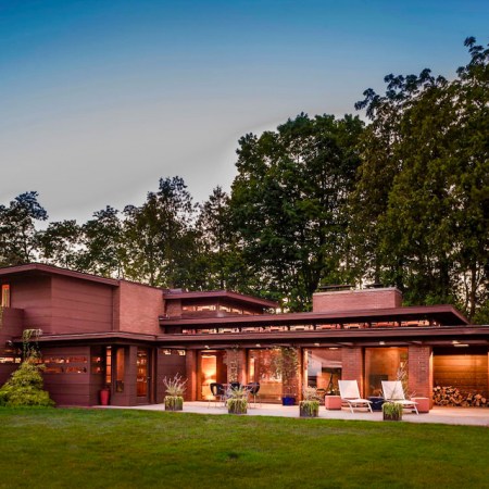 Frank Lloyd Wright’s Life Magazines Dream House is one of the best Airbnbs on Lake Michigan in 2021. This rental is pictured at dusk on Lake Michigan