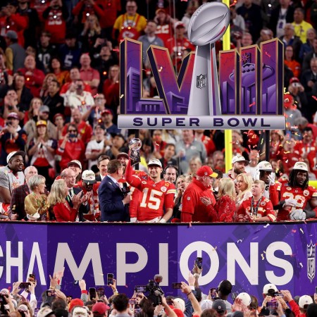 LAS VEGAS, NEVADA - FEBRUARY 11: Patrick Mahomes #15 of the Kansas City Chiefs holds the Lombardi Trophy after defeating the San Francisco 49ers 25-22 in overtime during Super Bowl LVIII at Allegiant Stadium on February 11, 2024 in Las Vegas, Nevada. (Photo by Steph Chambers/Getty Images)