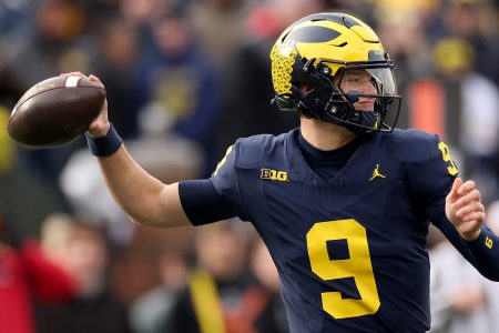 Michigan's J.J. McCarthy throws the ball against the Ohio State Buckeyes. He's now expected by some to be the No. 2 overall pick at the NFL Draft in April.