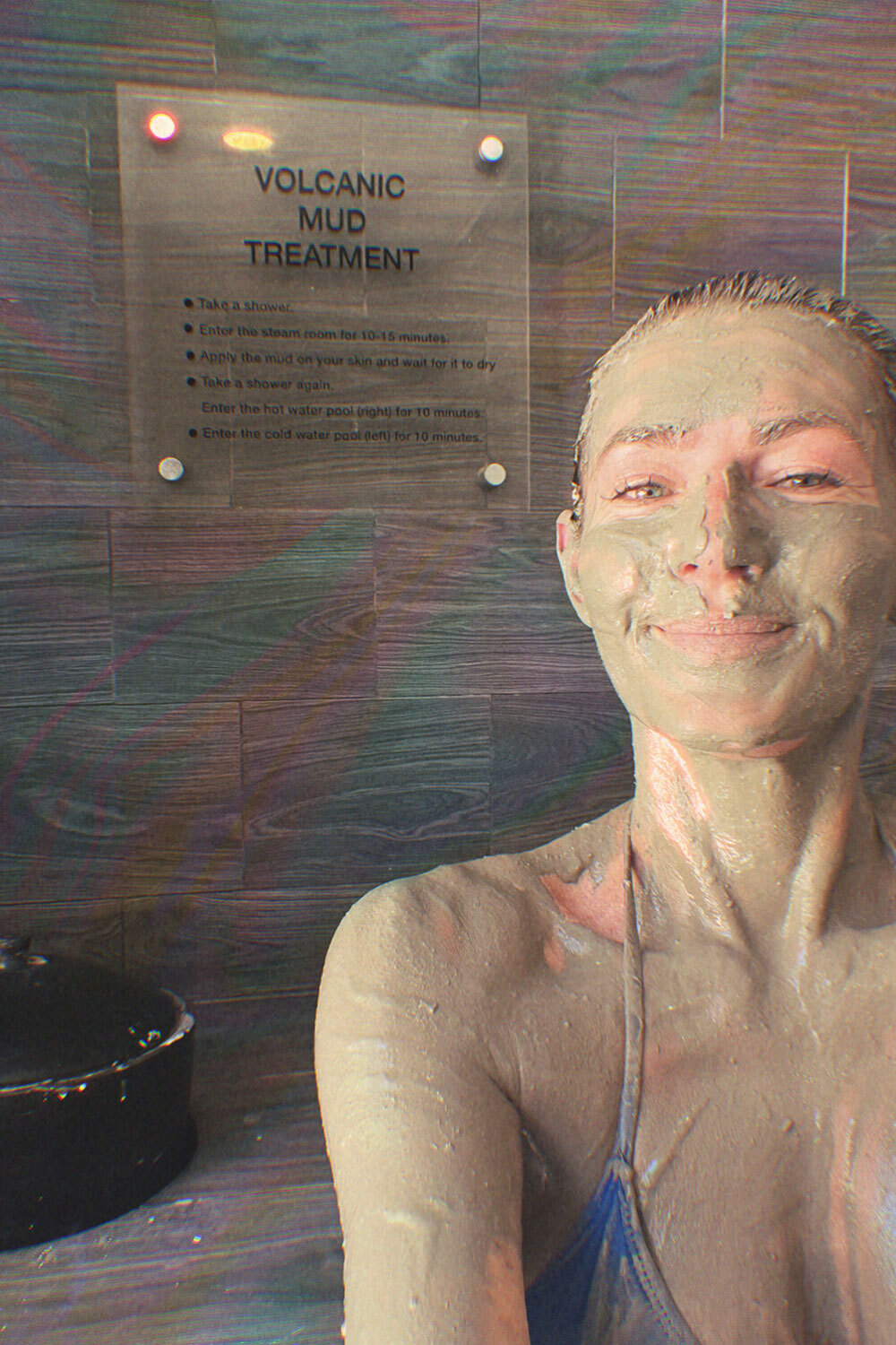 Journalist Kinga Philipps undergoing a volcanic mud treatment in Costa Rica