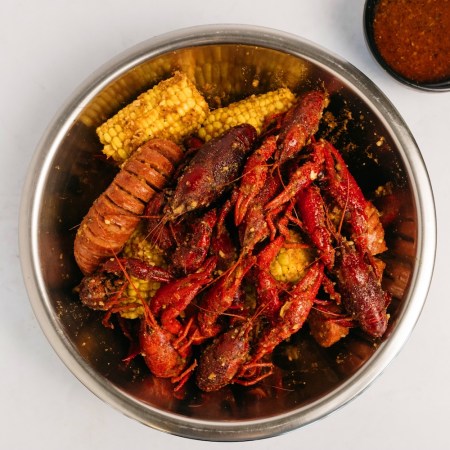 Crawfish in a bowl seasoned with corn on the cob