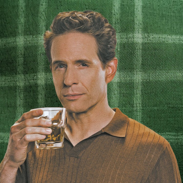 Glenn Howerton holding some Four Walls whiskey.