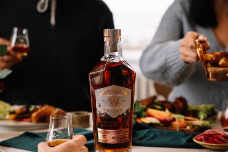 A bottle on a table from the Westward Whiskey Club