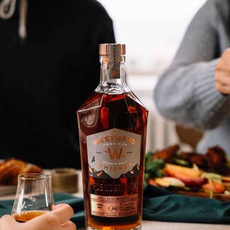 A bottle on a table from the Westward Whiskey Club